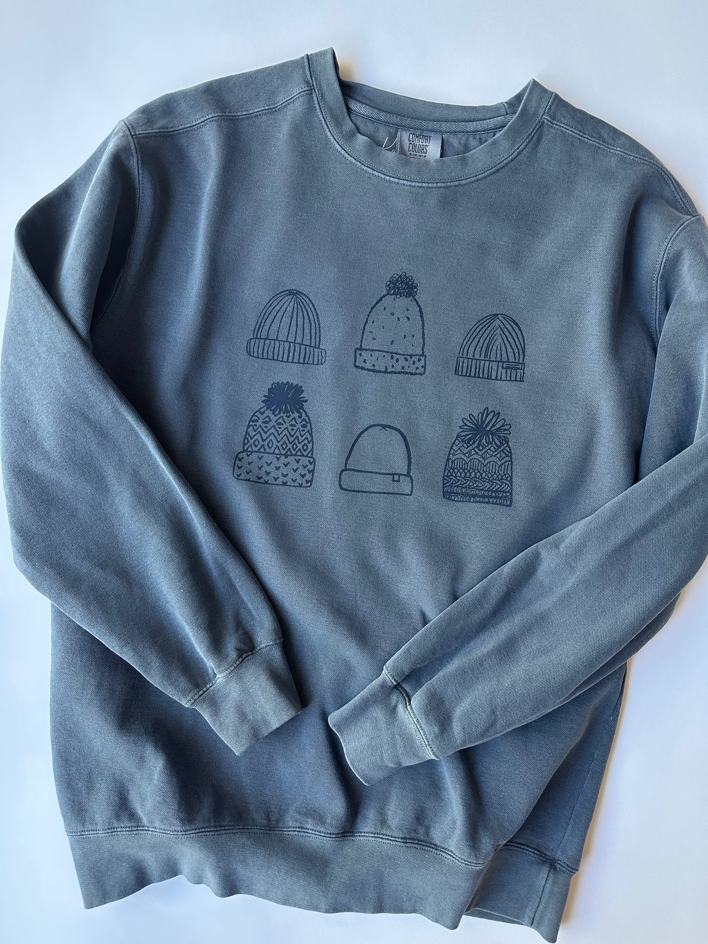 Beanies on Denim Sweater