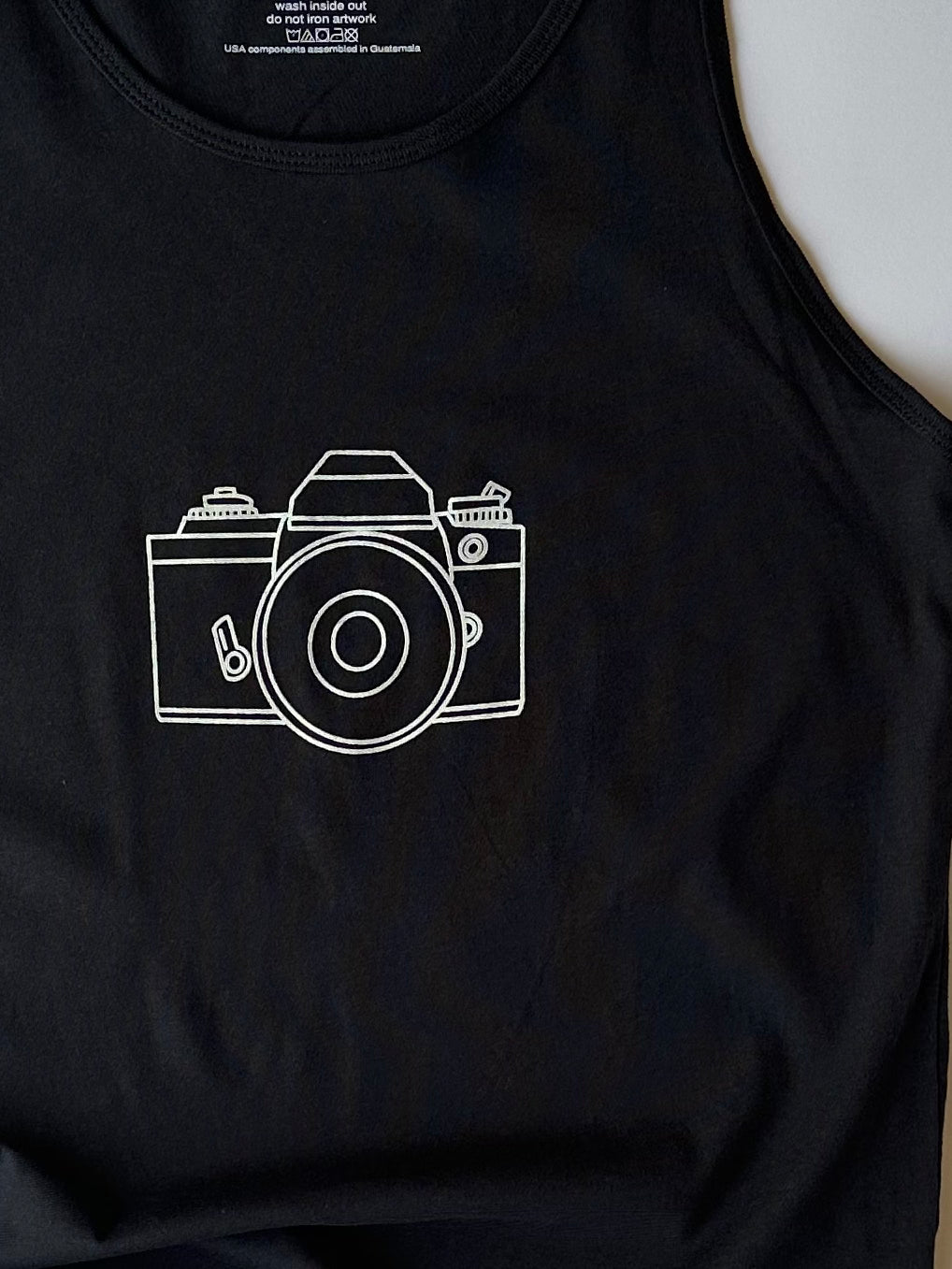 Nikon Camera on Dark Grey Tank