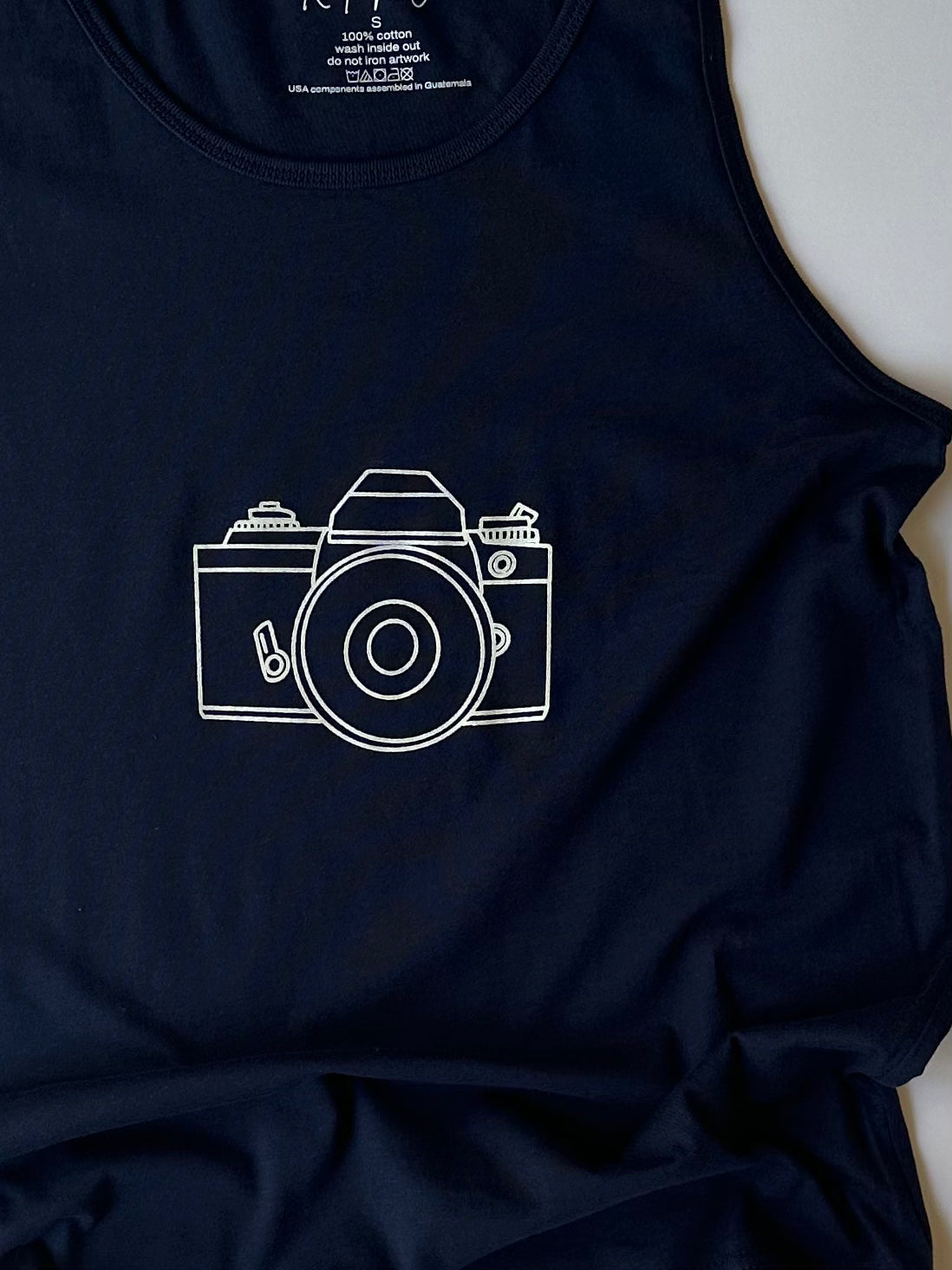 Nikon Camera on Adult Navy Tank