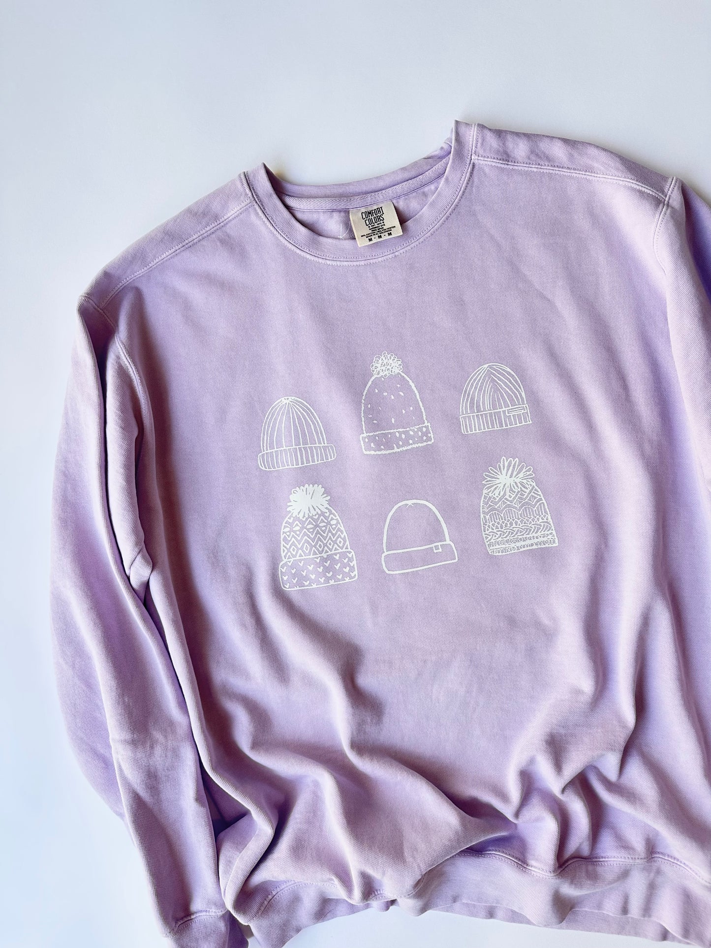 Beanies on Lilac Sweater