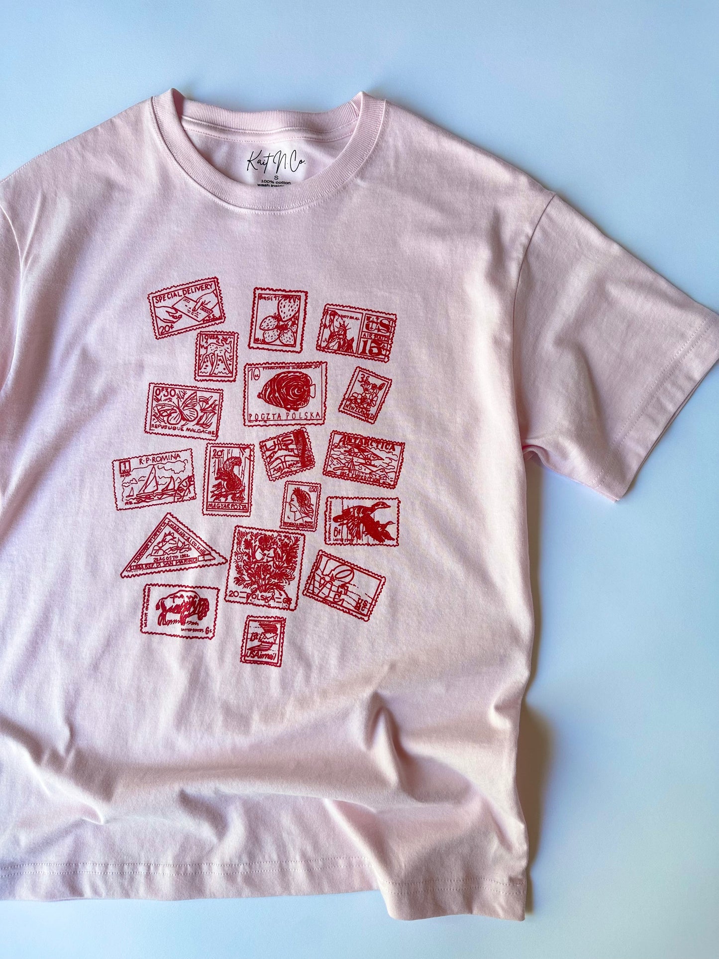 Vintage Stamps on Adult Soft Pink Short Sleeve Tee