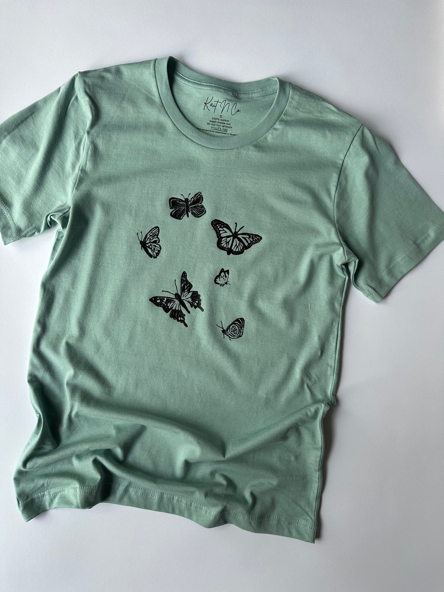 Butterflies on Dusty Teal