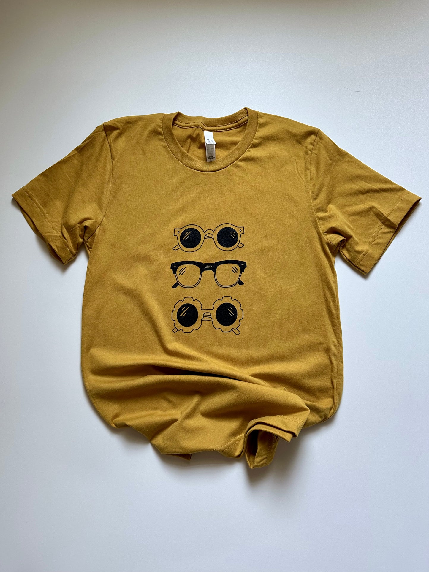 Sunglasses on Mustard