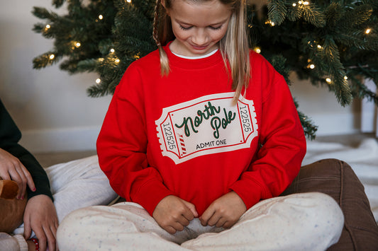 Kids North Pole Ticket on Red Sweater