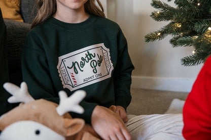 Kids North Pole Ticket on Green Sweater