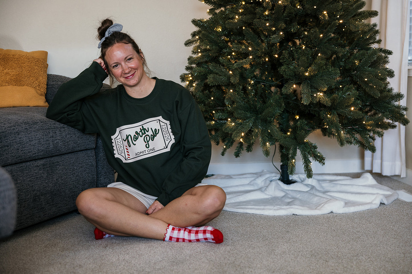 Adult North Pole Ticket on Green Sweater