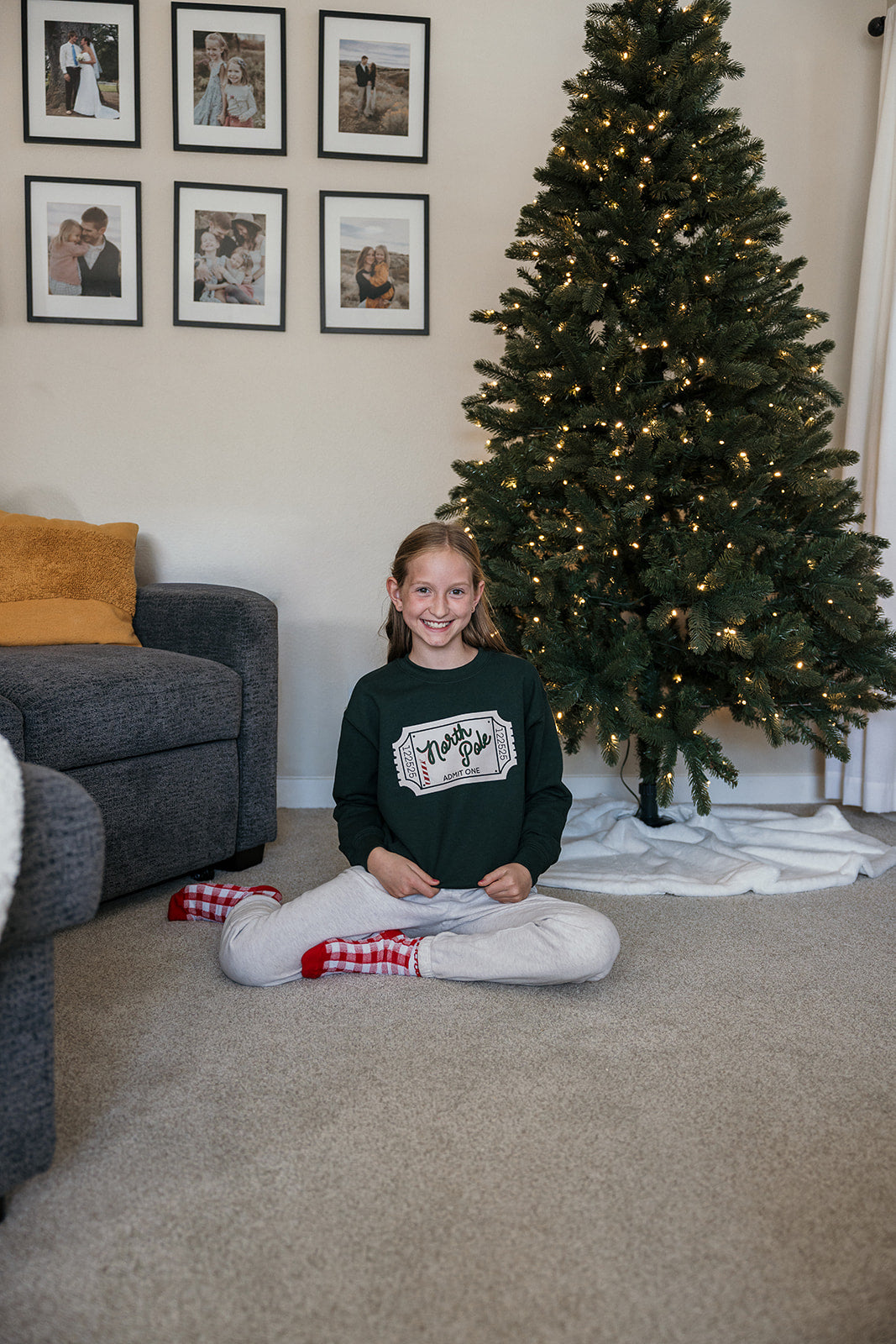 Kids North Pole Ticket on Green Sweater