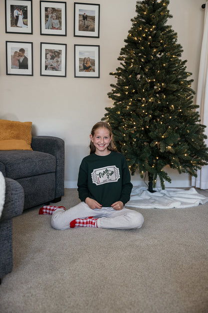 Kids North Pole Ticket on Green Sweater