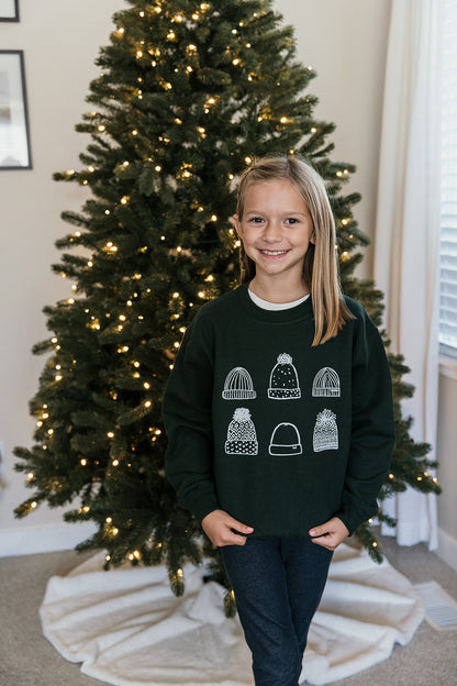 Kids Beanies on Green Sweater