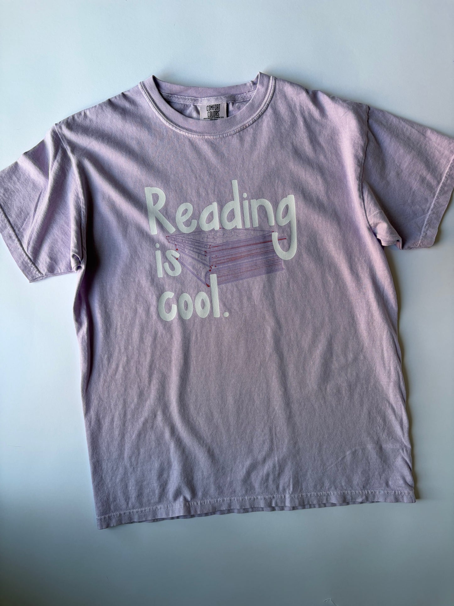 Reading is cool. on Youth Vintage Washed  Bright Lavender Short Sleeve Tee
